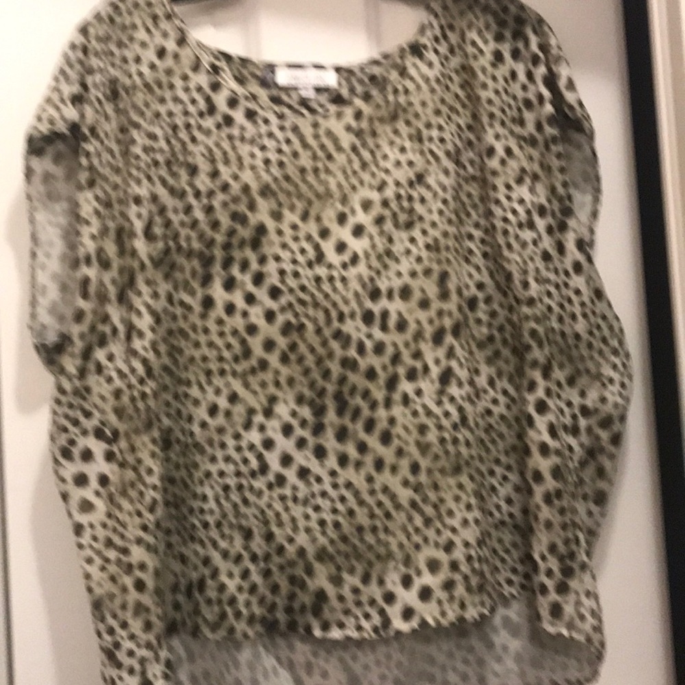 Jennifer Lopez leopard green blouse